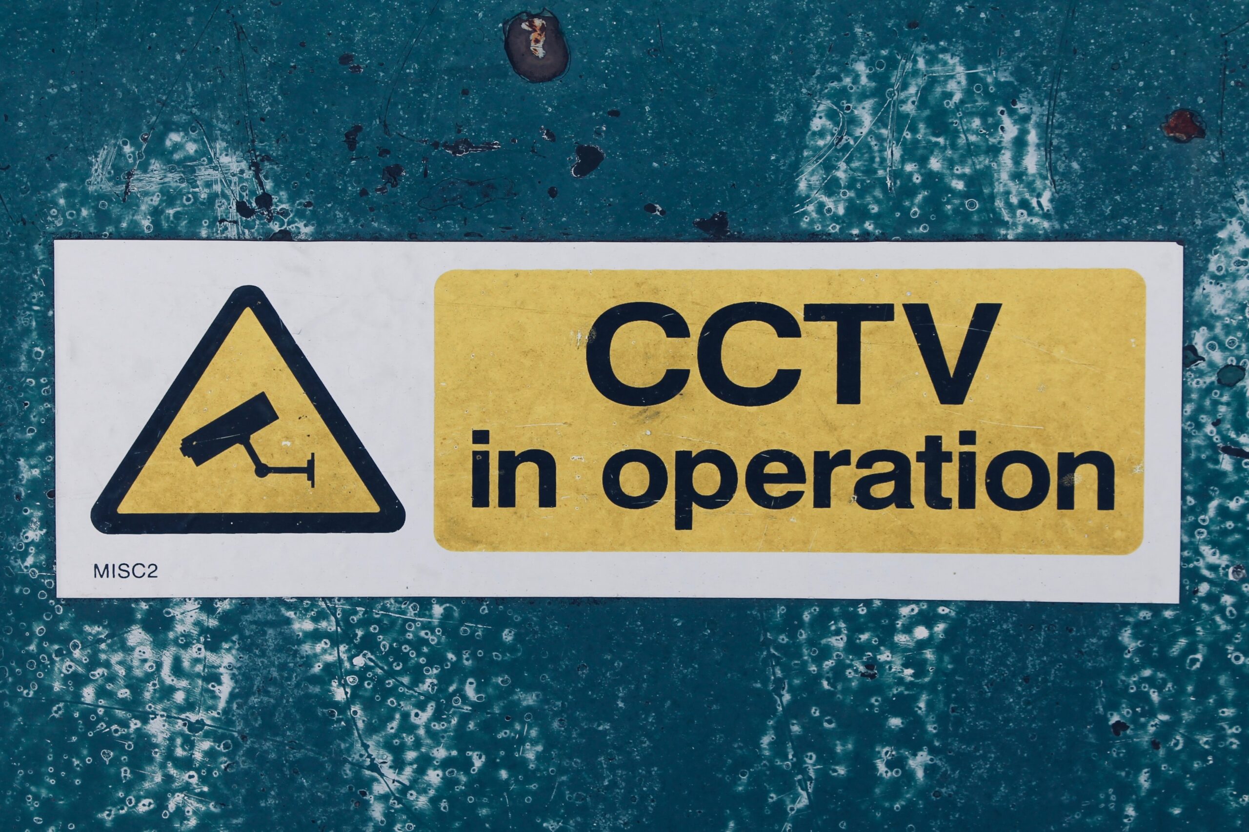 Warning sign indicating that the use of a CCTV system is in operation.